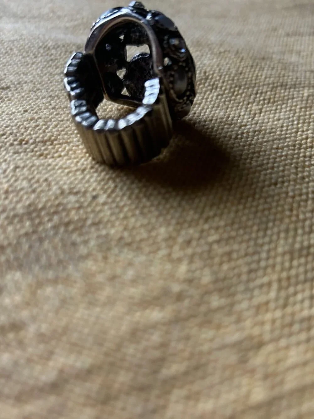 Vintage style sliver-tone dome cocktail ring featuring an intricate cluster of